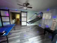 Relax, Snap, and Stream In Style.  Spacious 4 King Bed Room w/Game Room.