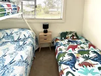 Cosy unit with delightful park and water views. Perfect for a family holiday!