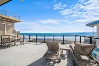 Spacious 5-bedroom Beachfront Home on Beach Road!
