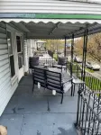 420 Friendly 3 bedroom upstairs apartment. Street parking. Covered porch
