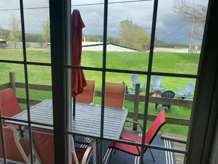 This AMAZING river getaway is PERFECT for YOU!  Private deck, grill & fire pit!