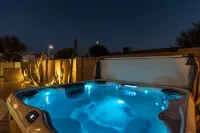 Stay & Play: Heated Pool, Putting Green, and Games