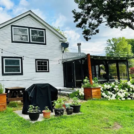 Experience the Charm of a Rustic Lakefront Cottage, Perfect for Year-Round Fun!