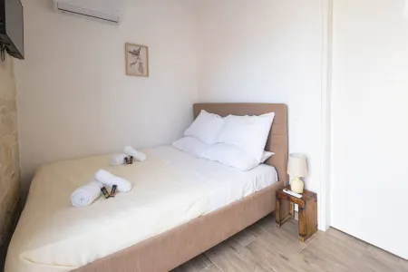 SeaStone House for relaxation, 4min walk to beach! Отели рядом с достопримечательностью «Afrata Beach»