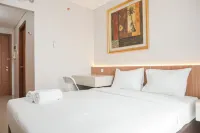 Comfortable and Minimalist Studio Apartment at Woodland Park Residence Hotels in Kramat Jati