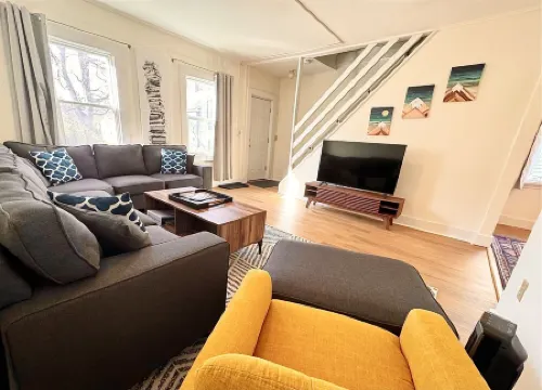 Walk to campus; open concept kitchen/living;nature trail at end of this quiet st