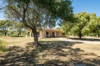 Lovely cottage with private wide garden near Orosei