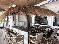Sundown Resort & Austrian Pension House Hotel dekat Pantai Cagban