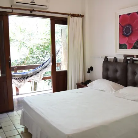 Hotel Pousada Encanto de Itapoan Отели рядом с достопримечательностью «Пляж Итапуа»