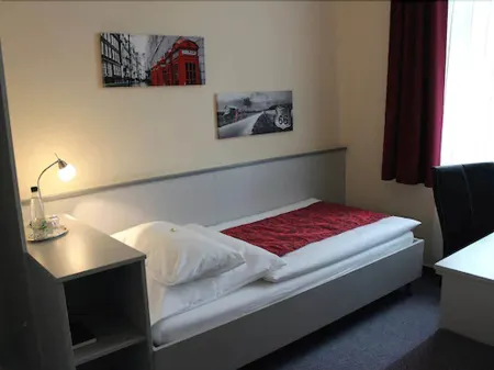 Aparthotel 1A Отели в г. Нойкирхен