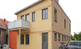 Terraced House in Malchow by Monkey Forest