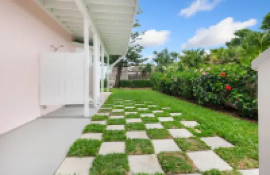 Tropical Elegance Meets Coastal Adventure at This Stunning Oceanfront Retreat!