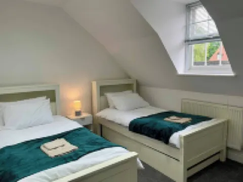 寬敞的四臥室房屋 - 可住11人, 帶花園和停車位