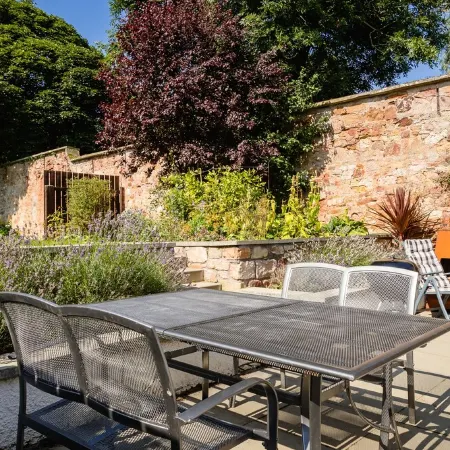 Luxury cottage with garden and parking in the heart of the village.  Sleeps 8.