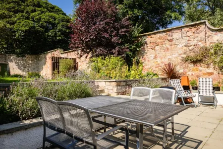 Luxury cottage with garden and parking in the heart of the village.  Sleeps 8.