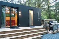 Cozy new cabin in Tofino, blend of luxury and nature. Close to beaches and town Hoteles en Tofino