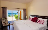 SAND Luxurious Tranquility on a Private Beach In A Protected Marine Environment