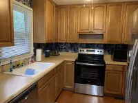 Charming house with a large fenced lot in a central location