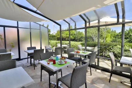 Hotel le Coudon Отели в г. Сольес-Пон