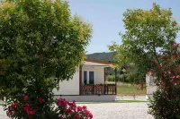 Bungalow with pool in a park-like garden by the sea! 스칼리노 호텔