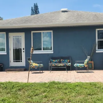 Charming lakefront 3BR 3BA house w/ EV chg in heart of Mt. Dora. Nature abounds.