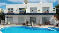 Kato Paphos Suites - 1-Bedroom Apartment. Pool view, WiFi & a/c. Great Location
