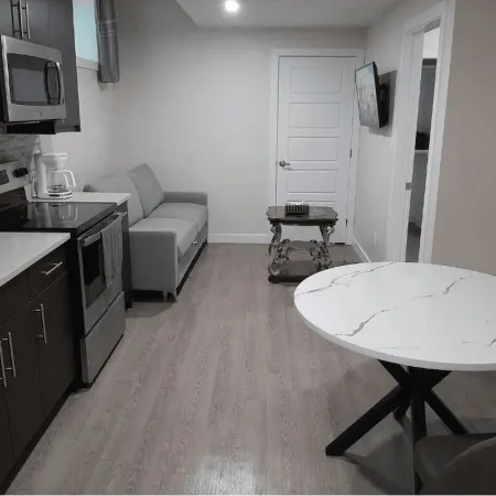 A cozy one bedroom suite located in the peaceful neighborhood of Evergreen.