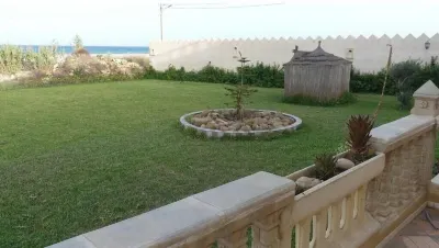 Residence le Chateau فنادق في 