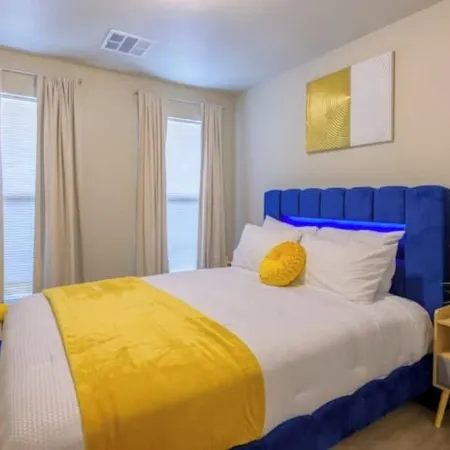 Four beds w/ 1 king, 3 queen beds each with a TV. Centrally located! No pets