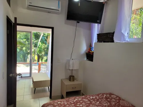 One bedroom tiny condo PB1 with huge pool! Extended stays get discounted rates!