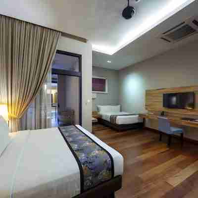 王后精品套房酒店 Rooms