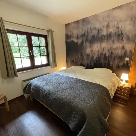Ardennes villa with riverside garden and views