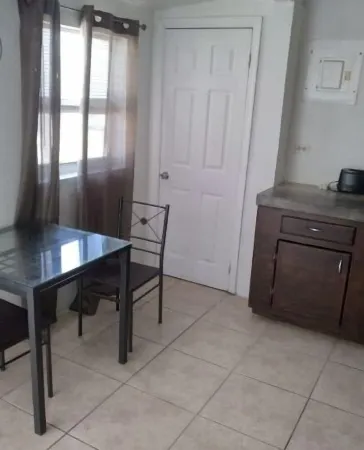 The beach is our back yard apt #1A