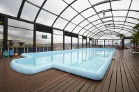 COSMOS 100 Hotel + Centro de Convenciones - piscina