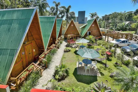 Pousada Chalé Suiço Bombinhas Отели рядом с достопримечательностью «Lagoa Beach»