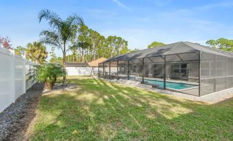 Modern 4BR Retreat Near Beach Heated Pool