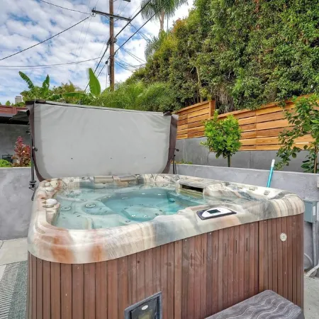 Family-friendly summer vacation home with big hot tub 2 blocks from beach.