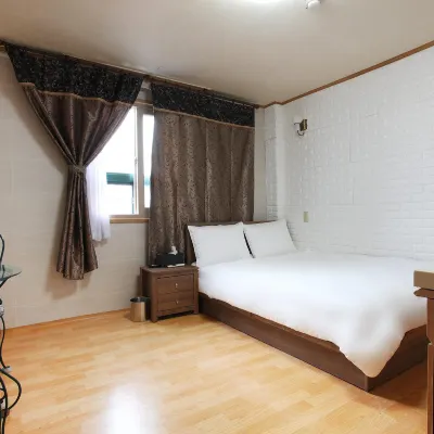 Seogwipo Handu Motel Отели рядом с достопримечательностью «Водопад Чонгбанг»