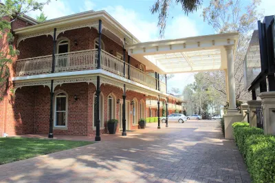 Carlyle Suites & Apartments