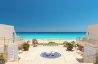 Oceanfront white sand beach condo
