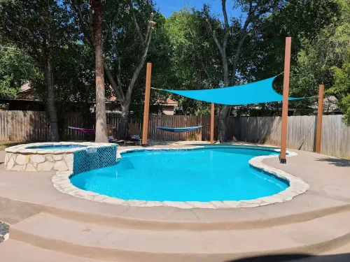 VRBO HOME AWAY Paradise Getaway House- With Pool and Hot Tub!