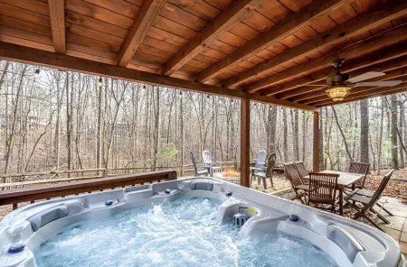 Spacious Cabin with King Bed, Fire Pit & Hot Tub!