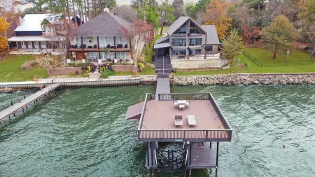 Lake House with pool + hot tub on Golf Course with boat dock