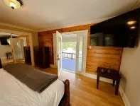 Riverfront house with a party barn & private boat ramp