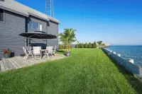 Private Beach on a Fenced in Property Sunset Views