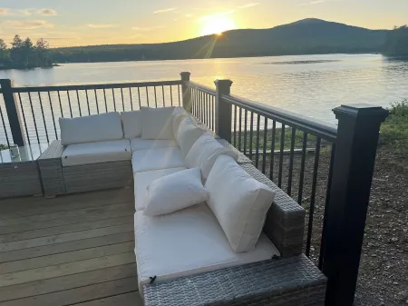 Snowmobiler & Ice Fishing Paradise right on the water with mountain views!