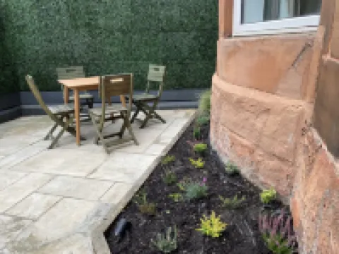 Stunning 2-bed flat with private patio in heart of the west end