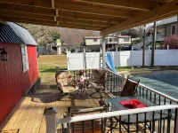 River Road Retreat.  Cabin minutes away from trails w/ hottub & seasonal pool!