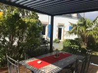 Blue longere by the sea