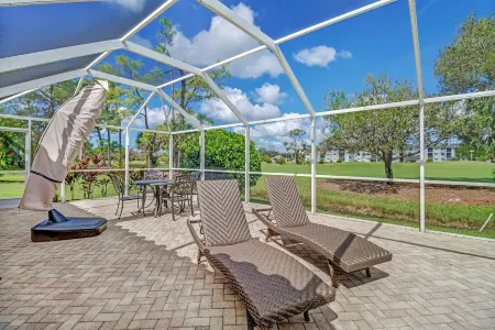 Pristine Luxury Heated Pool Home on the Golf Course